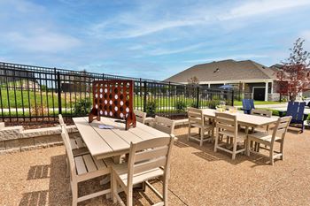 Pocket park with tables and chairs and grills